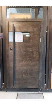 НАШІ РОБОТИ Вхідні двері металеві в будинок. З двох сторін  накладки из тонованої вологостійкої фанери